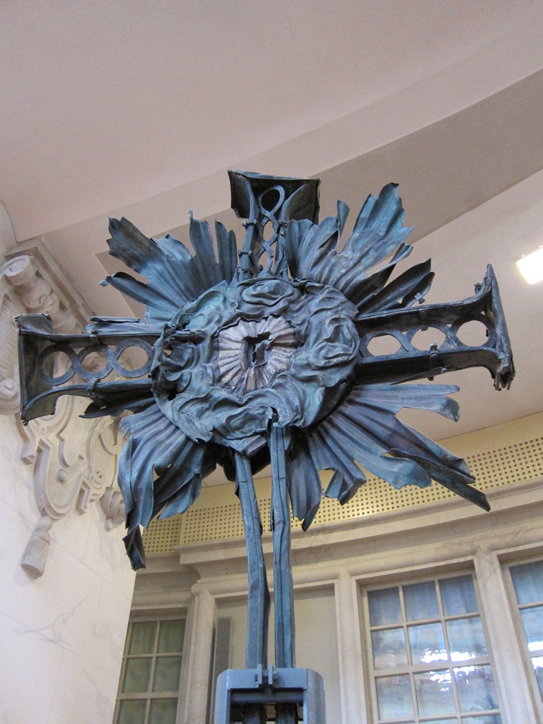 The cross that used to top the lantern on the dome, stripped of its plating.