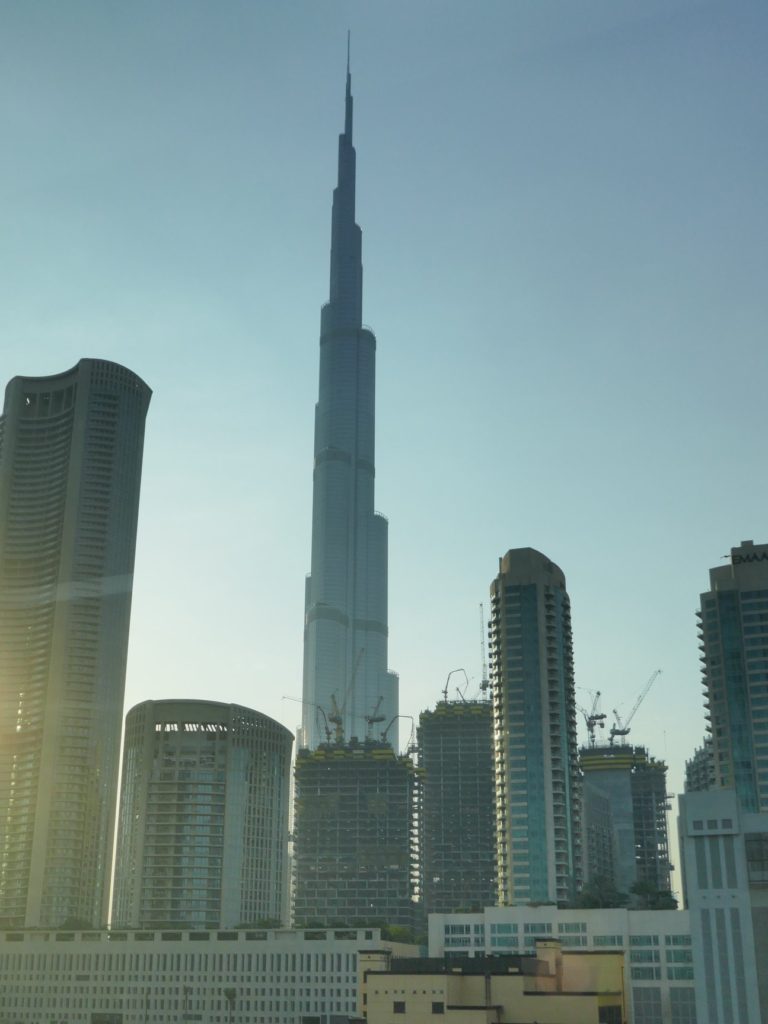 Seeing Burj Khalifa from the Dubai metro at sunrise